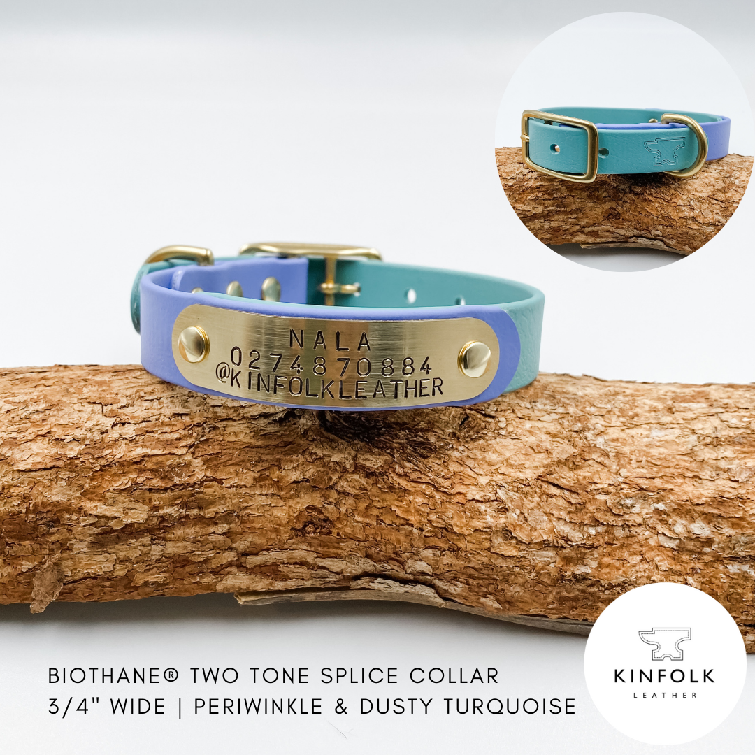 Two-tone spliced collar with nameplate on a wooden log, featuring Kinfolk Leather branding.