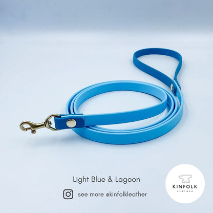 Lagoon blue BioThane cat lead showing its 1.5 metre finished length and lightweight brass clip.