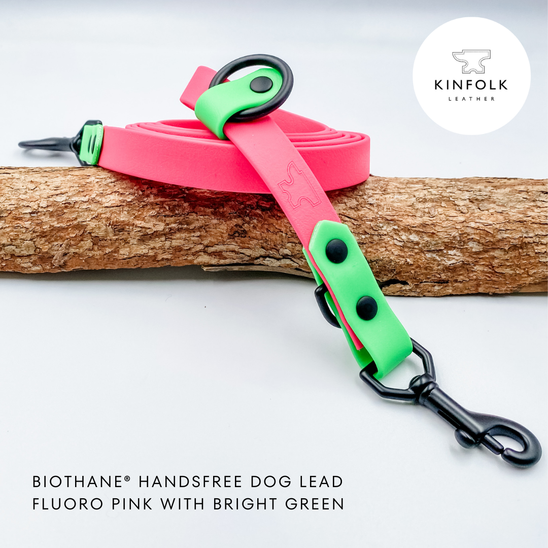 A Handsfree Dog Lead with nameplate Made from Waterproof Biothane in Fluoro Pink and Green - custom made by Kinfolk Leather in New Zealand